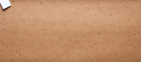 Aufkleber - A brown cork board with textured white paper sheets providing a blank space for adding text or artwork. Creative banner. Copyspace image