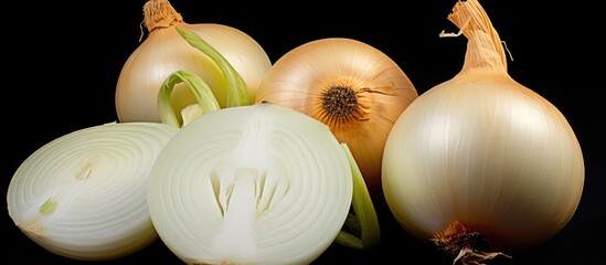 Aufkleber - A top view of fresh ripe white onions is displayed on a black background with a free copy space image available