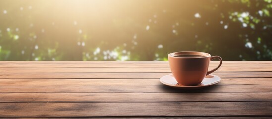Poster - A cup of tea is placed on a wooden table creating a peaceful image with ample empty space around it for copy