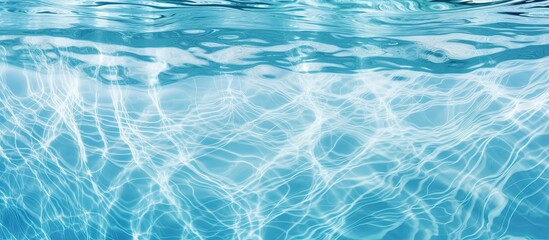 Poster - A high resolution background image of a swimming pool filled with water featuring a textured abstract or rippling wave pattern. Creative banner. Copyspace image