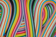 Abstract vibrant color wave rainbow strip paper background, Colorful curve striped background, macro view