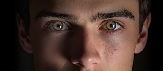 Canvas Print - A young man s closeup portrait with a plain background behind him providing ample copy space