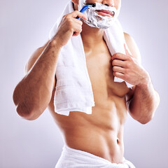 Canvas Print - Body, razor and shaving face for cleaning, health and hair removal for hygiene isolated on white background in studio. Cream, foam and man cutting beard for skincare, grooming or muscle for beauty