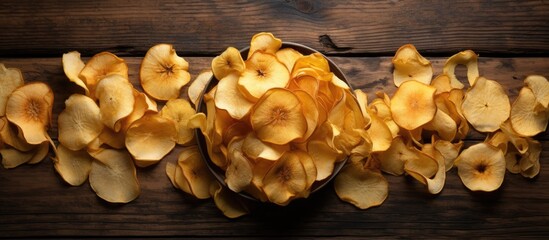 Aufkleber - an organic natural food consisting of dried apple chips is beautifully presented in a close up top v