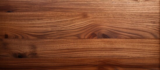 Fototapete - A copy space image featuring a textured wooden surface in brown color It serves as a cutting board for cooking purposes