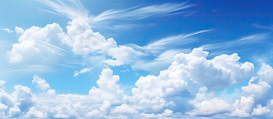 Aufkleber - Beautiful white clouds floating in the clear blue sky creating a mesmerizing copy space image
