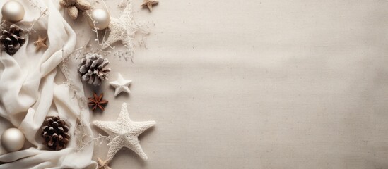 Poster - A festive New Year s background with Christmas decorations arranged on a linen texture The design is a celebration of Xmas featuring a flat lay pattern with ample copy space for added creativity