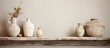 Home decor featuring a distressed wooden shelf with neutral colored vases a shabby photoframe and a rough plaster grey wall creating a copy space image