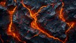 © SH Design - Close-up view of crackling flames burning orange, red, and yellow in a fireplace, lava.