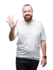 Sticker - Young caucasian hipster man wearing casual t-shirt over isolated background showing and pointing up with fingers number five while smiling confident and happy.