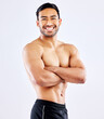 Happy asian man, portrait and muscular body with confidence for workout routine on a white studio background. Male person or bodybuilder with smile or arms crossed in fitness, exercise or weight loss