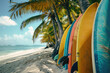 Many colorful surfboards on a tropical beach. Vacation and sport concept.