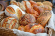 Fresh bread on shelves in bakery. Delicious loaves of bread in a baker shop. Modern bakery with assortment of bread.