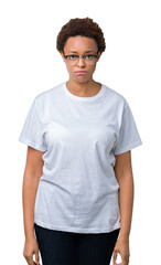 Sticker - Beautiful young african american woman wearing glasses over isolated background depressed and worry for distress, crying angry and afraid. Sad expression.