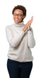 © Krakenimages.com - Young beautiful african american woman wearing glasses over isolated background Clapping and applauding happy and joyful, smiling proud hands together
