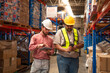 © kelvn - Warehouse employee worker with digital tablet talking on warehouse, Logistic industry concept.