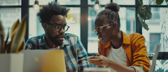 Poster - African American Creative Director and Female Project Manager Discuss Work on Laptop Computer in a Meeting Room Behind Glass Walls in an Agency.