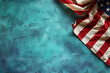 © Naseem - American flag celebrates Memorial Day against a backdrop of teal blue.