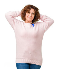 Poster - Middle ager senior woman wearing changeable blue color ribbon awareness over isolated background Relaxing and stretching with arms and hands behind head and neck, smiling happy