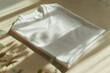 White t-shirt on wooden table mockup