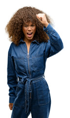 Sticker - African american woman wearing blue jumpsuit irritated and angry expressing negative emotion, annoyed with someone