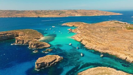 Wall Mural - Aerial  top view of Blue lagoon and boats on Comino island, Malta island