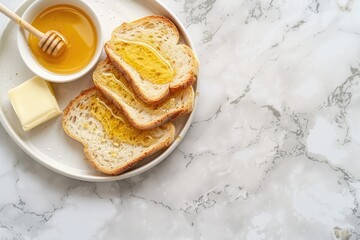 Wall Mural - Freshly baked bread slices with honey in a bowl, perfect for food blogs