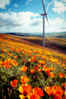 Wind turbine to produce clean renewable energy in a beautiful poppy field landscape