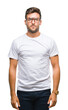 © Krakenimages.com - Young handsome man wearing glasses over isolated background with serious expression on face. Simple and natural looking at the camera.