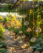 A garden with glass hanging from the trees.
