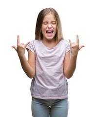 Wall Mural - Young beautiful girl over isolated background shouting with crazy expression doing rock symbol with hands up. Music star. Heavy concept.