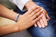 © peopleimages.com - Hands, senior patient and nurse for support, assurance and counseling on sofa in living room. Homecare, elderly man and caregiver for helping, compassion and kindness or empathy for old person