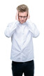 © Krakenimages.com - Young handsome blond man with hand on head for pain in head because stress. Suffering migraine.