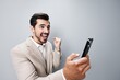 © SHOTPRIME STUDIO - man cyberspace phone hold portrait call smile business suit smartphone happy