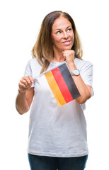 Wall Mural - Middle age hispanic woman holding flag of Germany over isolated background serious face thinking about question, very confused idea