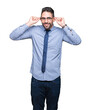 © Krakenimages.com - Young business man wearing glasses over isolated background Smiling pulling ears with fingers, funny gesture. Audition problem