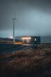 Futuristic battery storage and wind turbine setup in a remote, windswept location