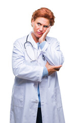 Sticker - Senior caucasian doctor woman wearing medical uniform over isolated background thinking looking tired and bored with depression problems with crossed arms.