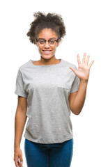 Sticker - Young afro american woman wearing glasses over isolated background showing and pointing up with fingers number five while smiling confident and happy.