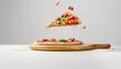 © Oleksiy - Flying wooden board with tasty pizza on white background