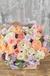 Small Beautiful bouquet of mixed flowers in woman hand. Floral shop concept . Beautiful fresh cut bouquet. Flowers delivery