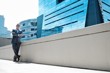 Poster - City, arms crossed and mature man in portrait for corporate company, professional career and ceo. Person, confidence and pride in urban outdoor of businessman, executive and positivity in Canada