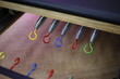 Closeup of reformer pilates stretcher springs. Metal springs with colored tips according to their intensity of force.