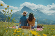Happy romantic couple enjoying picnic with view to Alps mountains.