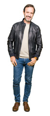 Wall Mural - Middle age handsome man wearing black leather jacket Relaxed with serious expression on face. Simple and natural looking at the camera.