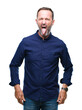 © Krakenimages.com - Middle age hoary senior man over isolated background sticking tongue out happy with funny expression. Emotion concept.