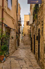 Naklejka na meble narrow street in the old town, Trani, Apulia, Italy, Europe March 2024