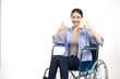 Beautiful young asian women with happy smiling sitting in a wheelchair on white background, healthcare concept, accident, insurance, life insurance, wellness, hospital.