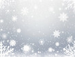 © aka_artiom - Silver panoramic background with a white snowflake design, a falling blizzard banner with a touch of gray magic for a transparent effect. Illustration of Christmas snowfall.