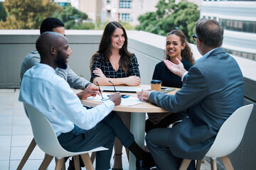 Sticker - Businesspeople, meeting and outside with smile at table on rooftop for brainstorming or collaboration. Teamwork, about us and planning for career with conversation with colleagues in town in London.